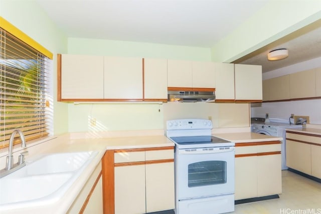 kitchen with sink, exhaust hood, white electric range, washer / clothes dryer, and white cabinetry