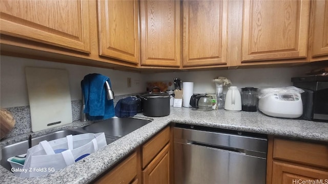 kitchen with dishwasher and sink