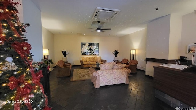 living room featuring ceiling fan