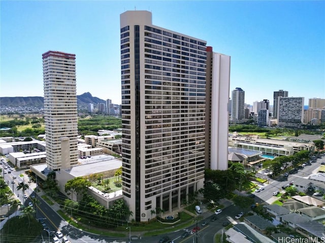 view of building exterior featuring a mountain view