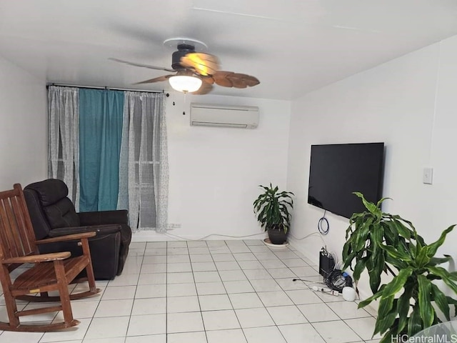 living room featuring an AC wall unit, ceiling fan, and light tile patterned floors