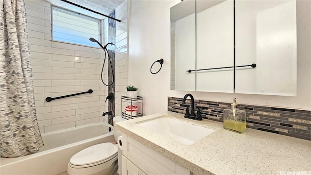 full bathroom featuring backsplash, shower / tub combo with curtain, vanity, and toilet