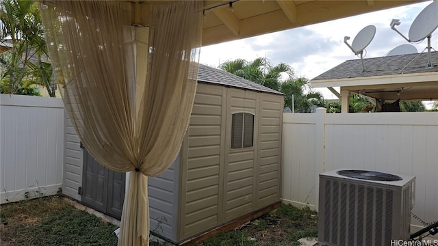 view of outbuilding featuring central air condition unit