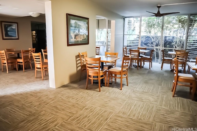 dining area featuring ceiling fan