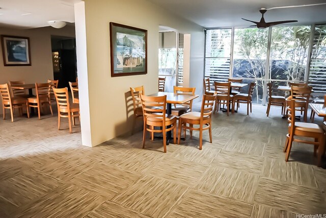 98-707 Iho Pl Unit 2102, Aiea, HI 96701 - dining area featuring ceiling fan and expansive windows