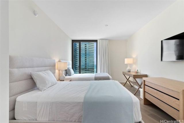 bedroom featuring hardwood / wood-style flooring