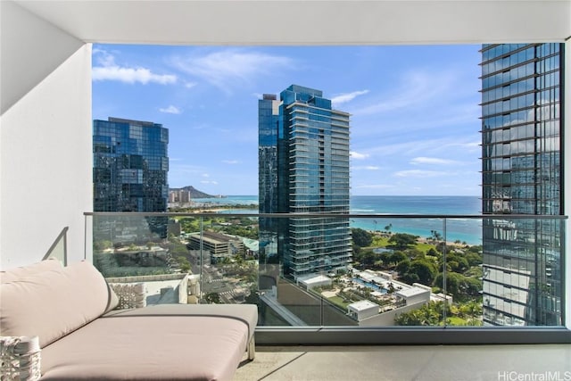 balcony featuring a water view