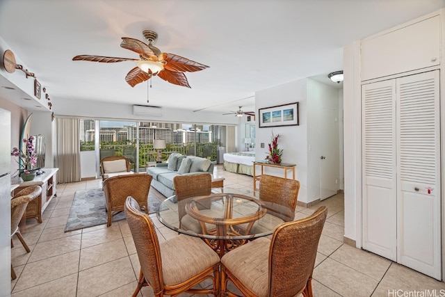 tiled dining area featuring an AC wall unit and ceiling fan