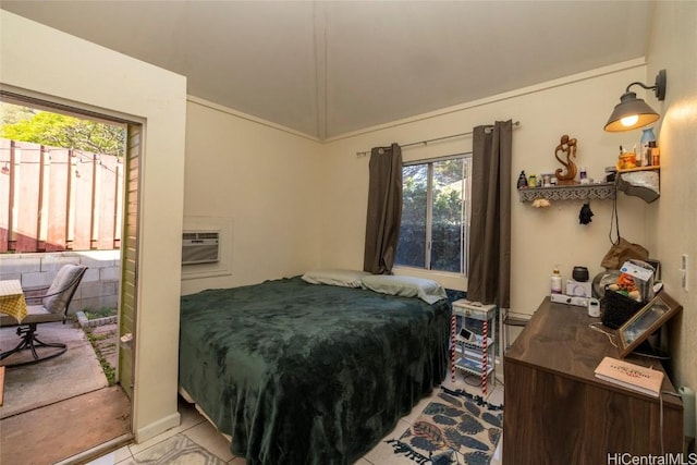 tiled bedroom featuring a wall unit AC