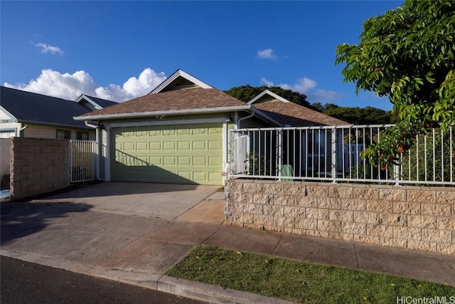 view of front of property with a garage