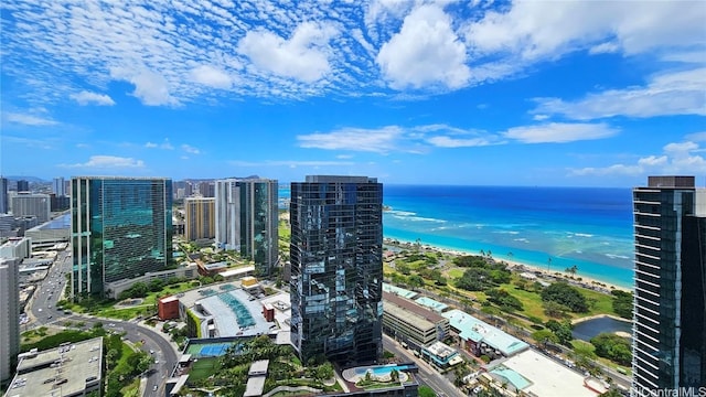 bird's eye view featuring a water view and a view of the beach