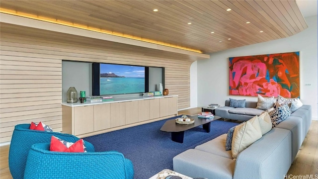 living room featuring wooden walls, wood ceiling, and light hardwood / wood-style flooring