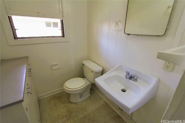 bathroom with sink and toilet