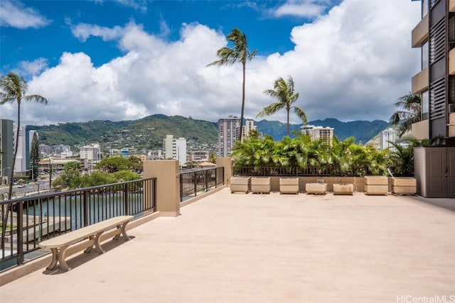 view of patio / terrace featuring a mountain view