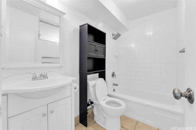 full bathroom with tile patterned flooring, vanity, toilet, and tiled shower / bath combo