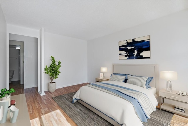 bedroom featuring hardwood / wood-style floors