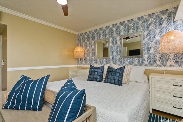 bedroom with a ceiling fan, crown molding, and wallpapered walls