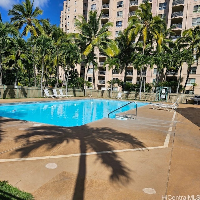 view of swimming pool featuring a patio