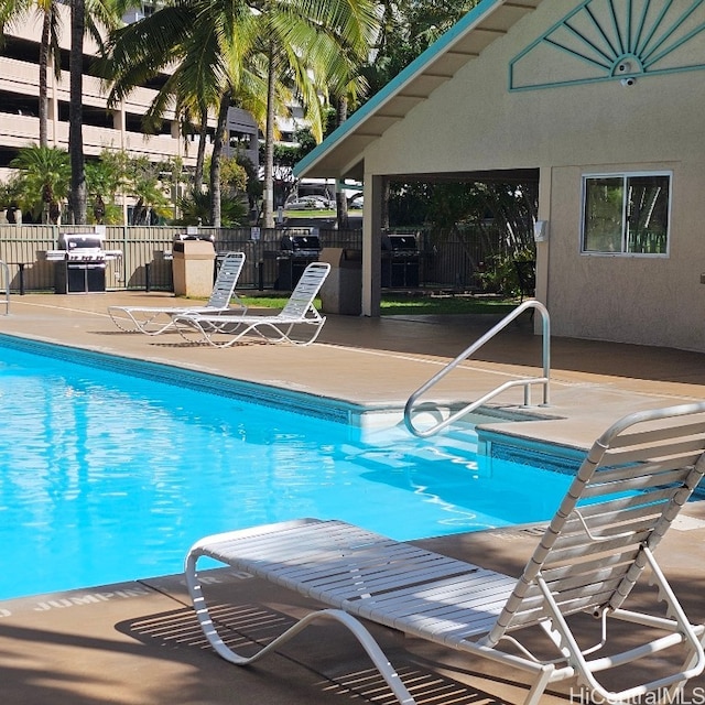 view of pool featuring a patio