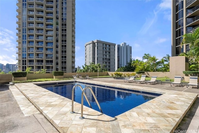 view of pool featuring a patio area