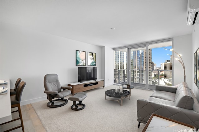 carpeted living room featuring an AC wall unit and a wealth of natural light