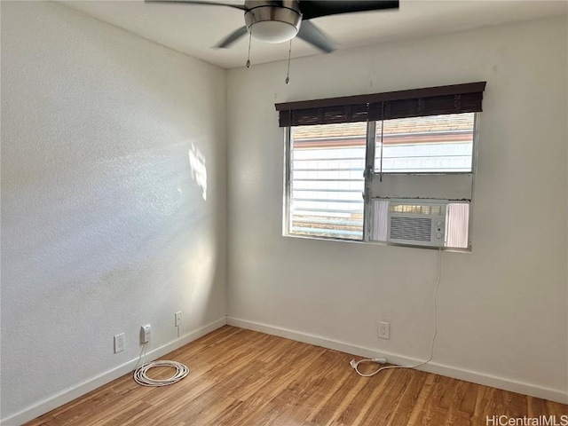 unfurnished room featuring light hardwood / wood-style flooring, plenty of natural light, and ceiling fan