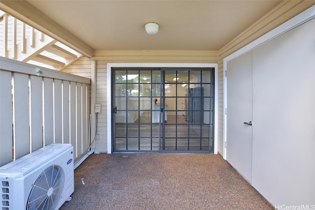 doorway to property with ac unit