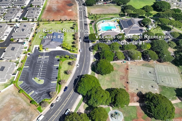 91-1022 Kaiau Ave Unit 3B, Kapolei, HI 96707 - aerial view of property and surrounding area featuring a pool area
