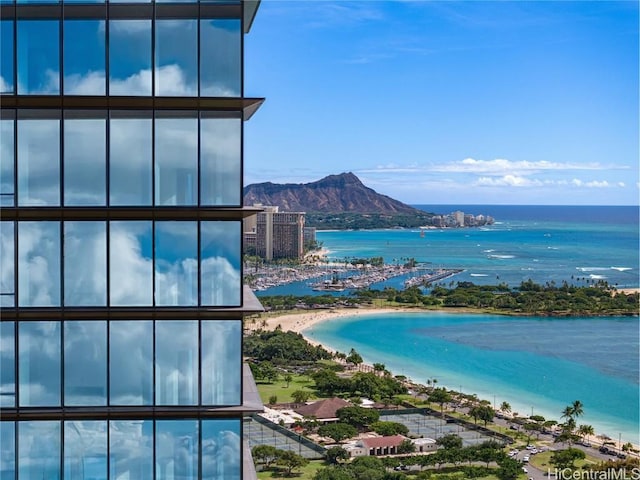 water view featuring a view of the beach and a mountain view