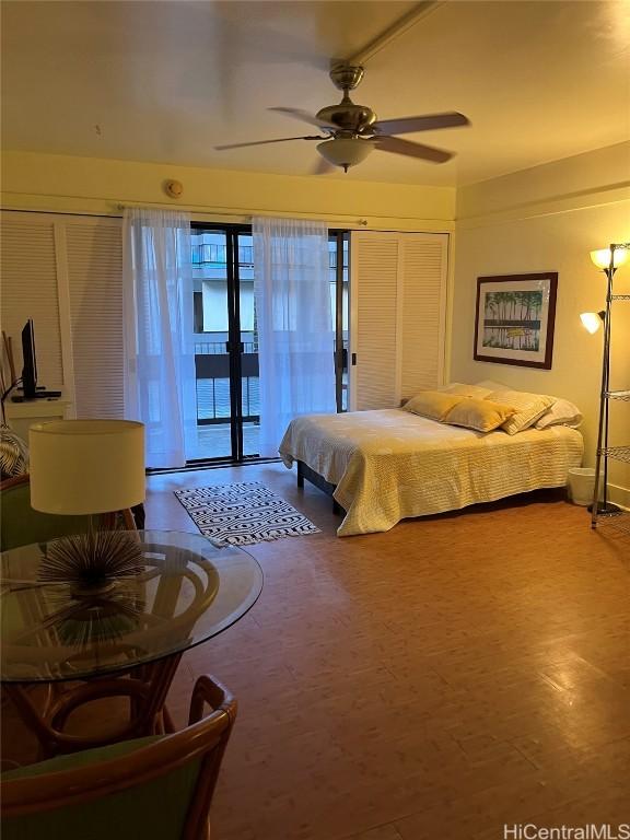 bedroom featuring ceiling fan and access to outside