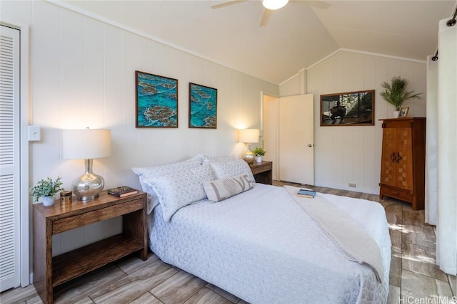 bedroom featuring ceiling fan and lofted ceiling