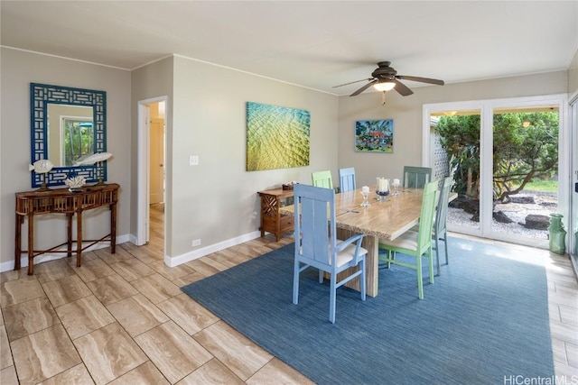 dining room with light hardwood / wood-style floors and ceiling fan