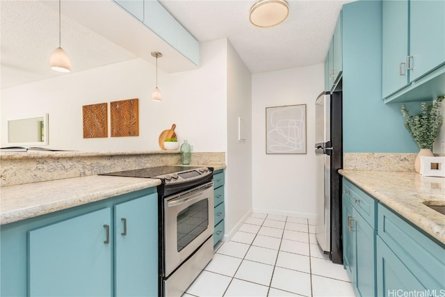 kitchen with blue cabinetry, appliances with stainless steel finishes, a textured ceiling, and pendant lighting