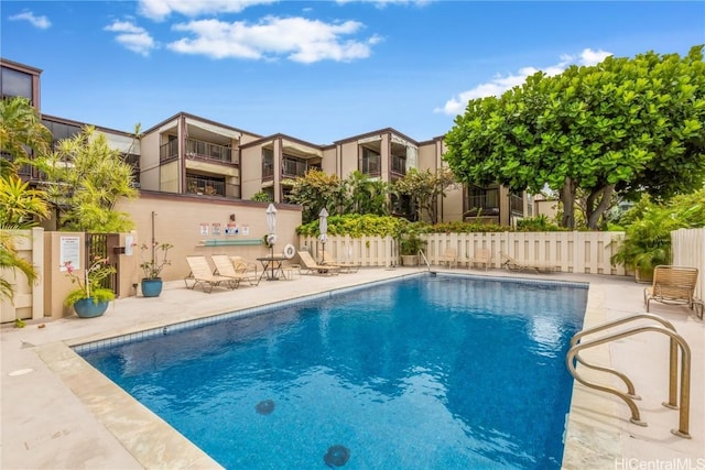 view of pool featuring a patio