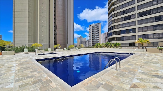 2499 Kapiolani Blvd Unit 401, Honolulu, HI 96826 - community pool with a patio and a view of city