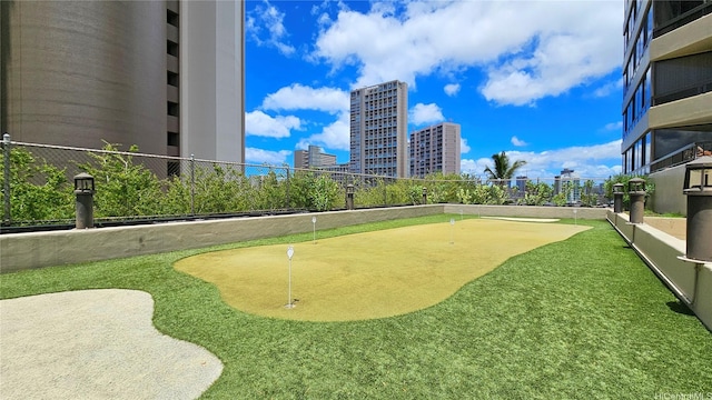 2499 Kapiolani Blvd Unit 401, Honolulu, HI 96826 - view of home's community with a putting green and a city view