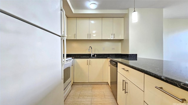 2499 Kapiolani Blvd Unit 401, Honolulu, HI 96826 - kitchen featuring white appliances, dark stone counters, and decorative light fixtures