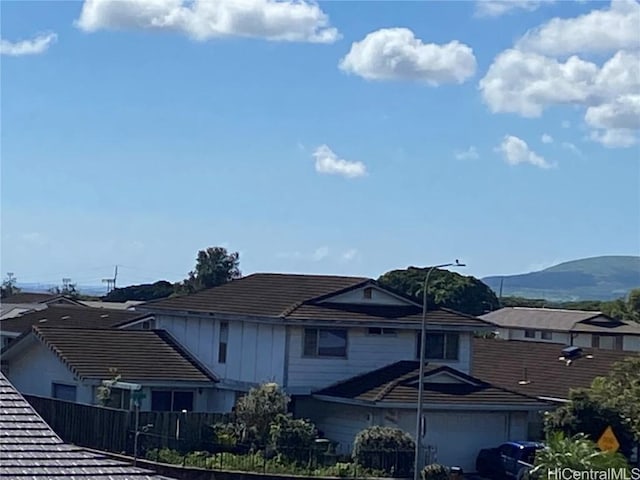 exterior space featuring a mountain view