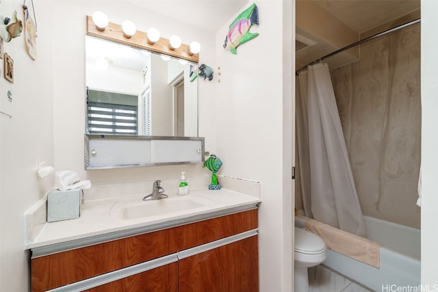 full bathroom with shower / tub combo with curtain, vanity, and toilet