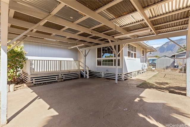 view of patio / terrace with a mountain view