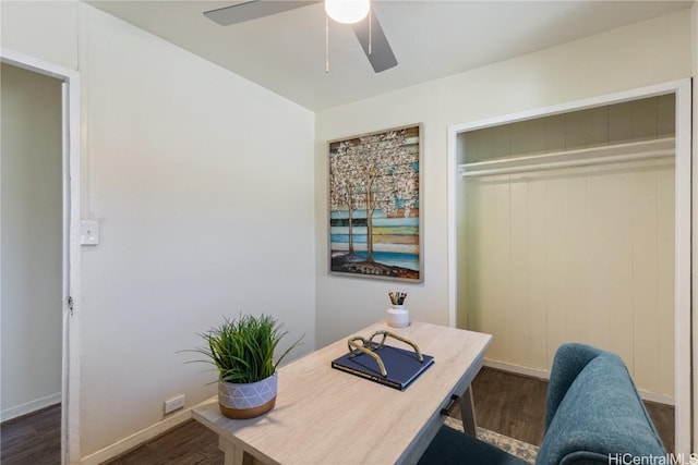 office space featuring ceiling fan and dark wood-type flooring