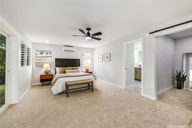 bedroom with access to exterior, ceiling fan, a wall mounted AC, ensuite bathroom, and light carpet