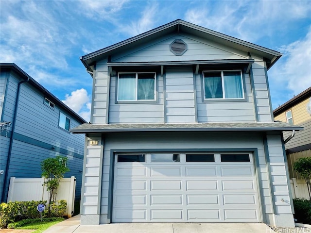 front of property featuring a garage