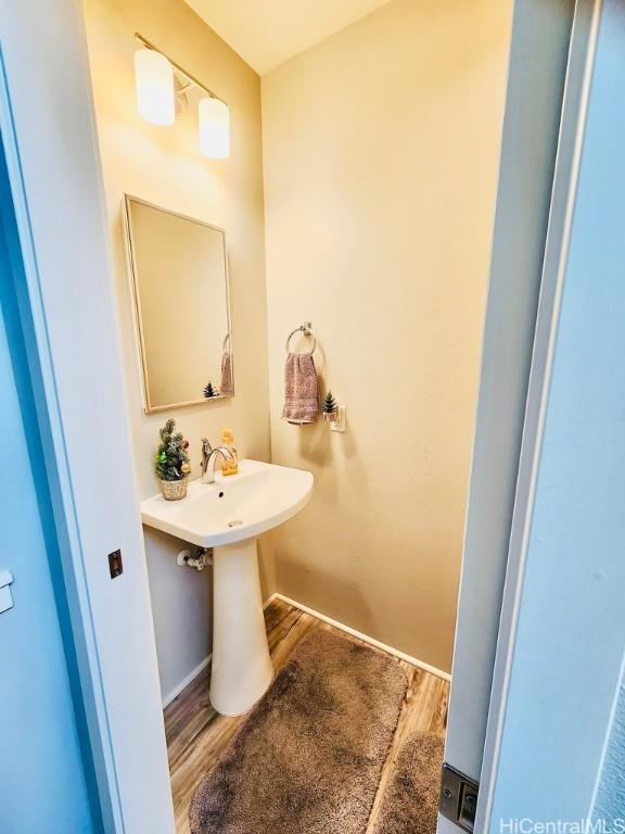 bathroom featuring hardwood / wood-style flooring