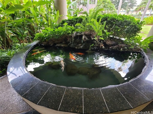 exterior space featuring a small pond