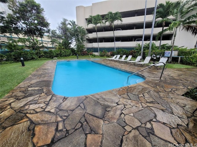 view of pool with a patio area