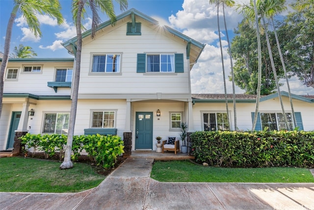 view of front of house with a front lawn