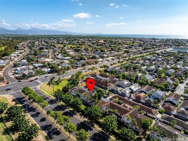 birds eye view of property featuring a mountain view