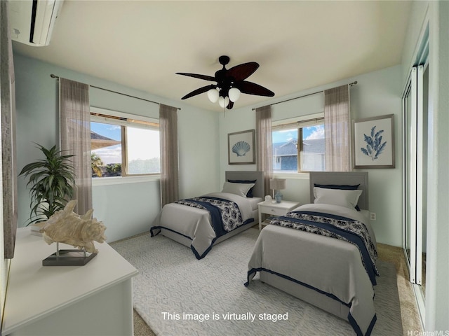 92-7139 Elele St Unit 805, Kapolei, HI 96707 - carpeted bedroom featuring a wall unit AC and ceiling fan
