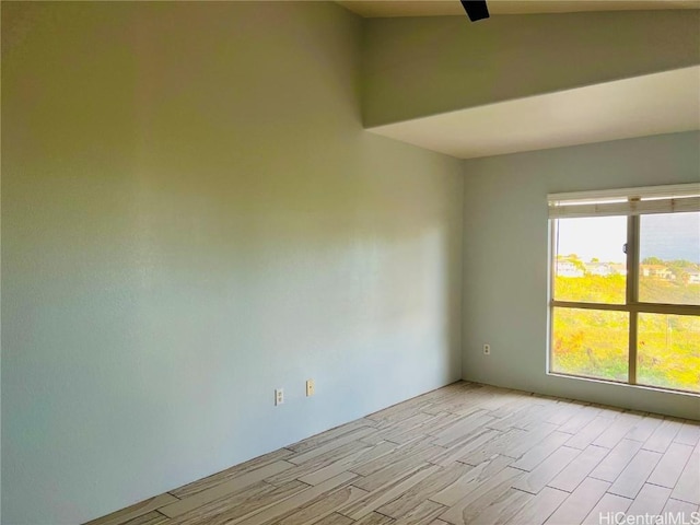 empty room with light hardwood / wood-style floors